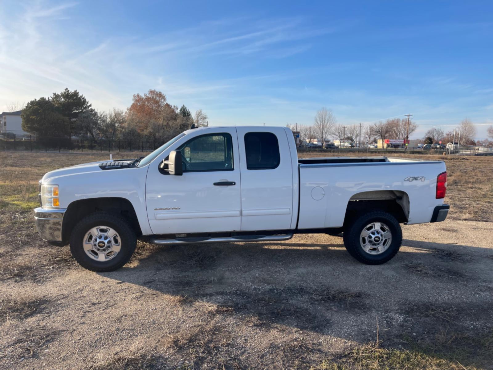 2013 Alpine White /Black Chevrolet Silverado 2500HD LT (1GC2KXCG1DZ) with an 6.0L V8 OHV 16V FFV engine, 6-Speed Automatic transmission, located at 813 E Fairview Ave, Meridian , ID, 83642, (208) 336-8230, 43.618851, -116.384010 - Photo #0